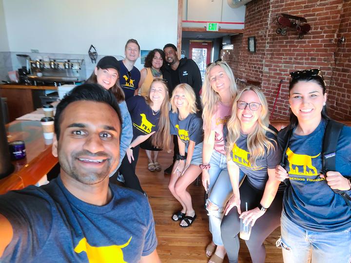 The Underdog Family volunteer crew gathered together at a Denver coffee shop