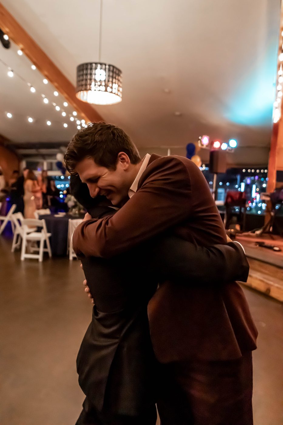 Co-founders Derrick and Chin embracing at the 2021 gala