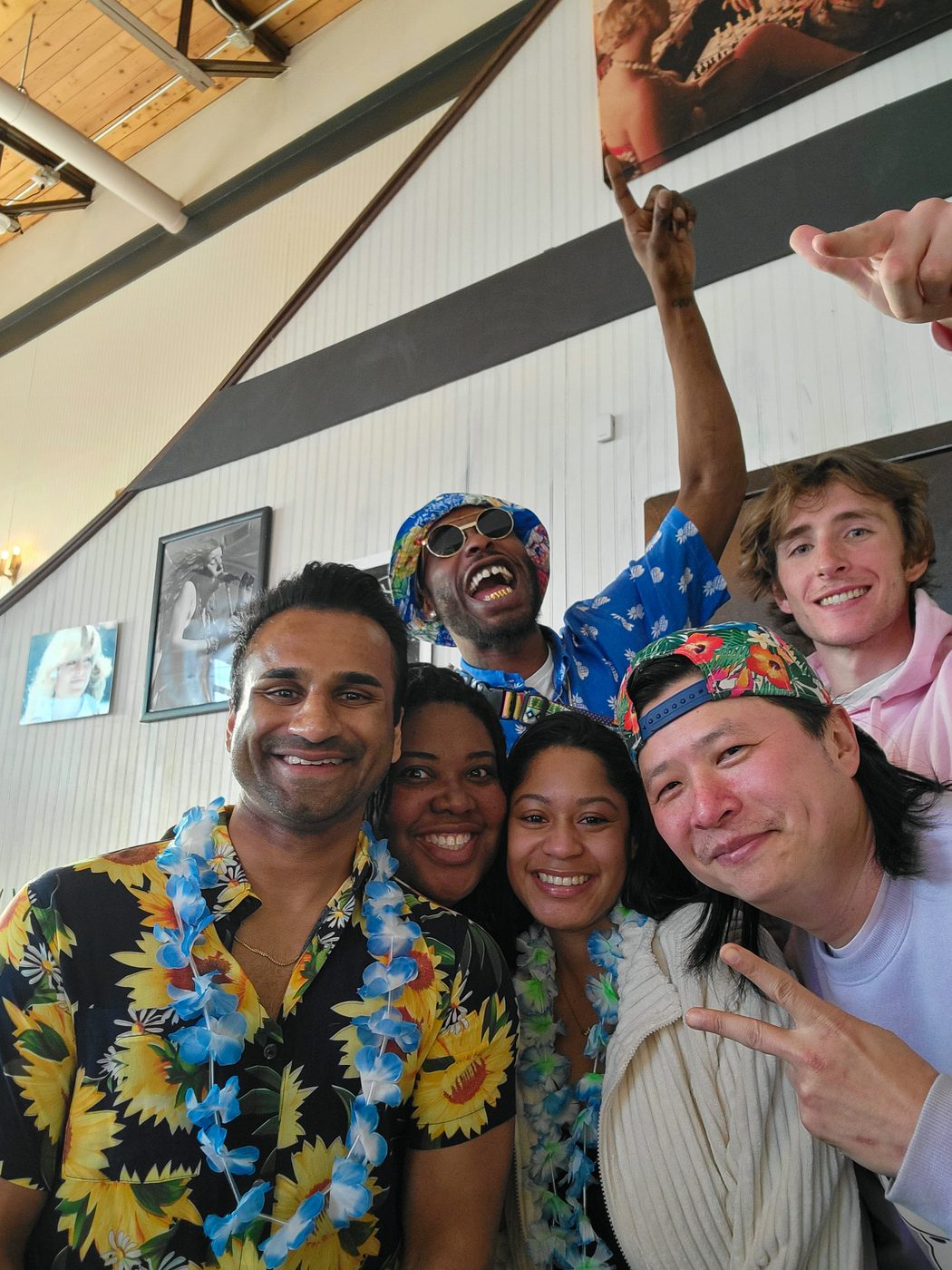 The crew in tropical attire at the benefit