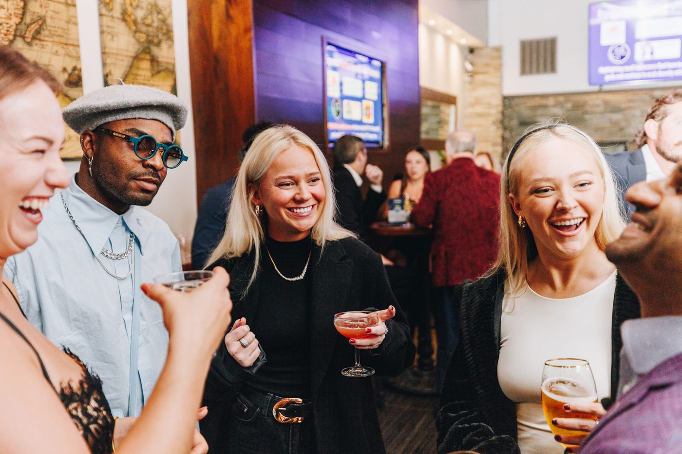 Guests laughing together at Fall Ball