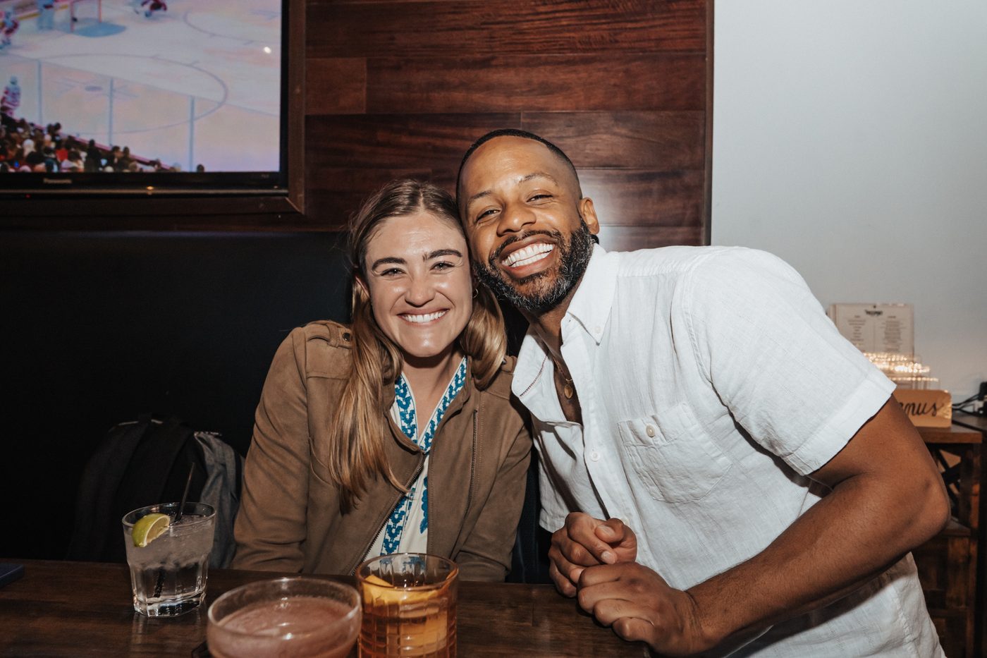 Two friends smiling at the mingle