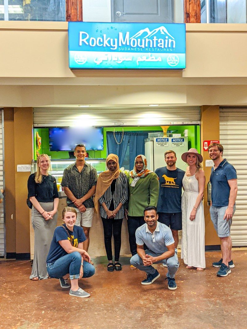 The Underdog Family team with the owners of Rocky Mountain Sudanese Restaurant