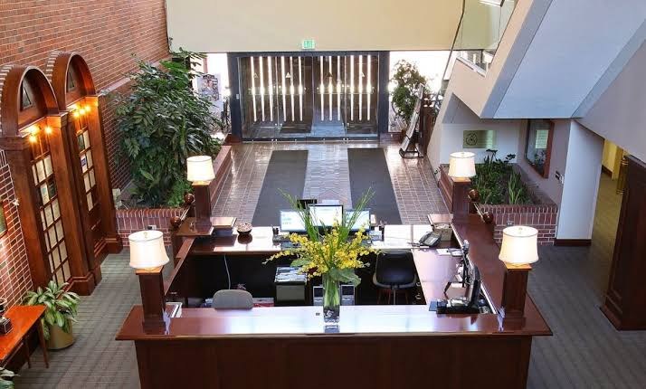 The brick and wood lobby of the Denver Athletic Club