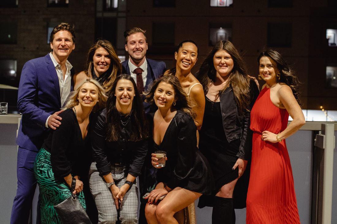 A group of friends dressed up together at the 2022 Fall Ball